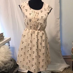 Cream colored cat patterned dress